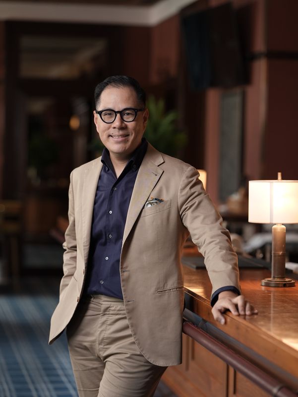 Executive portrait of an HKGTA leader in the clubhouse lounge